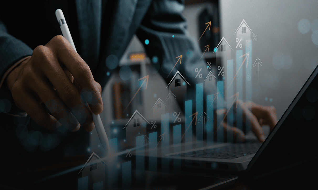 Businessperson analyzing financial data with rising graphs and charts.