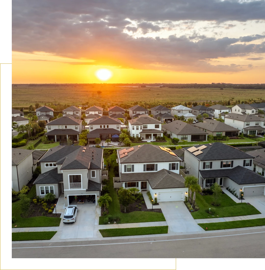 Aerial view of houses at dusk